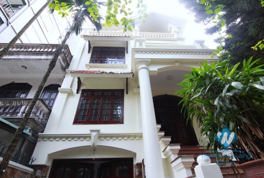 Unfurnished 4 bedrooms house with yard and garage for rent in Au Co st, Tay Ho area.